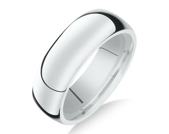 May include: A simple, polished silver wedding band with a rounded profile.