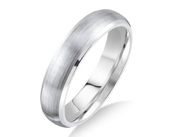 May include: A brushed silver wedding band with a rounded edge.
