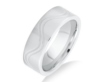 May include: A silver wedding band with a wavy design.