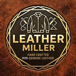 May include: A circular logo with a dark brown textured background featuring a gold outline of a jacket, needles, and thread. The text reads LEATHER MILLER, HAND CRAFTED, and With GENUINE LEATHER in gold lettering, enclosed by a geometric gold border.