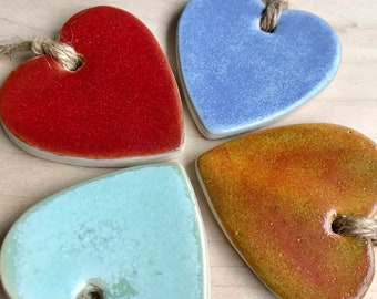 Handmade stoneware pottery Heart shaped decorations with string