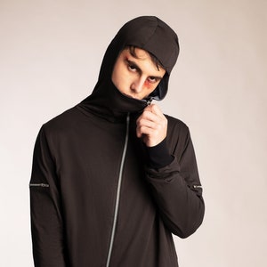 Asymmetrical futuristic comfy zip hoodie with zipper pockets contrast lining and hem