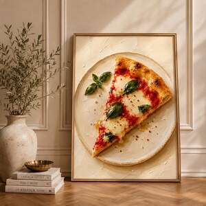 May include: A framed wall art print featuring a single slice of pizza on a round plate. The pizza has a golden-brown crust, red tomato sauce, melted white mozzarella cheese, and green basil leaves. The background is a textured cream color.