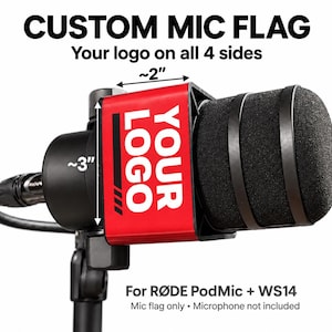 May include: A red custom microphone flag with the text YOUR LOGO on the side, attached to a black microphone. The flag measures approximately 2 inches by 3 inches. Text on the image includes CUSTOM MIC FLAG, Your logo on all 4 sides, and For RØDE PodMic + WS14.