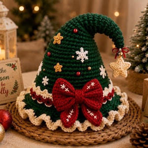 May include: A dark green crocheted hat shaped like a Christmas tree, featuring a large red bow, white snowflake appliques, small yellow stars, and red and gold beads. A cream-colored crocheted star hangs from the tip with a small gold bell.