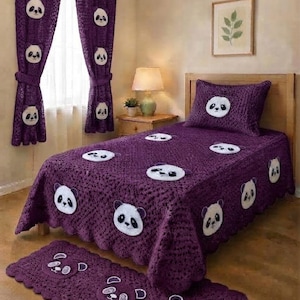 May include: A purple crocheted bedding set including a bedspread, a pillow sham, and a floor rug, all featuring white and black panda face appliques. The set is accompanied by matching purple crocheted curtains, also decorated with panda face appliques.