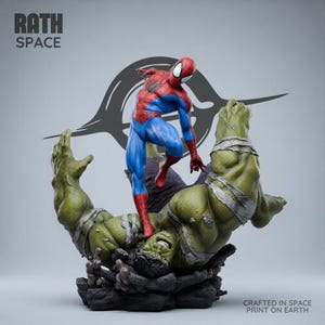 May include: A detailed figurine featuring a red and blue Spider-Man character standing atop a large, green, muscular Hulk figure. The Hulk is wrapped in grey bandages and positioned on a dark, rocky base. Text reads RATH SPACE and CRAFTED IN SPACE PRINT ON EARTH.