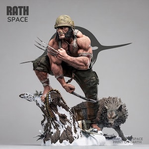 May include: A detailed resin statue of a muscular character wearing a tan helmet with the text 'BORN TO KILL', dark green tattered pants, and metal claws on one hand. The figure stands on a snowy base with a wolf and a belt of ammunition.