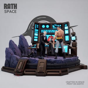May include: A detailed diorama featuring a muscular figure in a black and grey suit standing before a computer console with glowing blue screens. An older figure in a tuxedo holds a black cape nearby. The text RATH SPACE and CRAFTED IN SPACE PRINT ON EARTH are visible.
