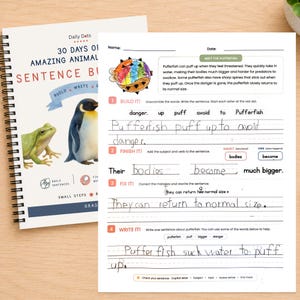 Puede incluir: Un cuaderno de espiral titulado 30 Days of Amazing Animals Sentence Building con una rana y un pingüino en la portada, junto a una hoja de ejercicios educativa completada sobre peces globo con frases escritas a mano y un dibujo.