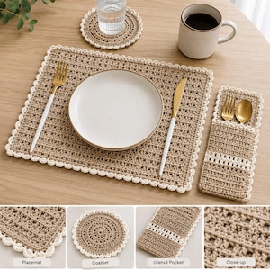 May include: A rectangular crochet placemat, a circular coaster, and a rectangular utensil pocket in tan cotton yarn with cream-coloured scalloped edges. The set includes a white plate, gold-toned cutlery, and a glass of water on a wooden table.