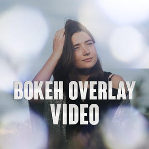 May include: A digital file featuring a person with dark hair wearing a black top, overlaid with a bright, out-of-focus light effect. The text BOKEH OVERLAY VIDEO is displayed in large, white, sans-serif capital letters across the center of the image.