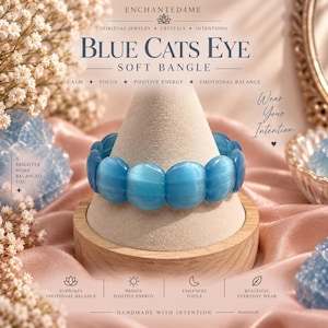 May include: A blue cats eye soft bangle featuring smooth, round, translucent beads with a chatoyant effect. The text on the image reads ENCHANTED4ME, BLUE CATS EYE SOFT BANGLE, WEAR YOUR INTENTION, A BRIGHTER MORE BALANCED YOU, and other phrases.