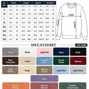 May include: A size chart for a sweatshirt featuring a table with US sizes S through 5XL, including chest, length, sleeve, and shoulder measurements in inches and centimeters. A line drawing of a sweatshirt shows measurement points, and a color palette.