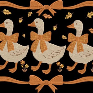 May include: An embroidery design featuring three light beige geese facing left, each wearing a textured orange bow. The geese are surrounded by small orange acorns, autumn leaves, and flowers, framed by two horizontal orange ribbons with bows.