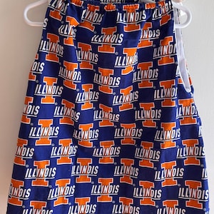 Toddler dress in University of Illinois fabric with coordinating Illini fabrics