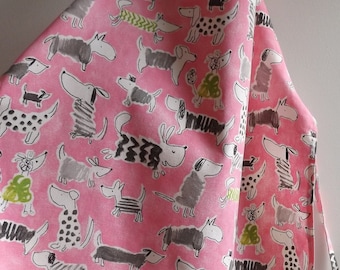 Child&#39;s Top-Stitched Apron in Waverly Fabric Back to School Supplies Pink Background with Variety of Dogs in Gray, Green and White
