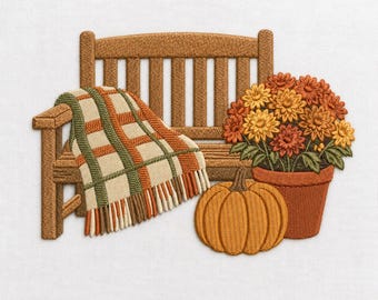 May include: An embroidered design featuring a brown wooden bench draped with a cream, green, and orange plaid throw blanket with fringe. Beside the bench sits a terracotta-colored pot filled with orange and yellow flowers and a round pumpkin.