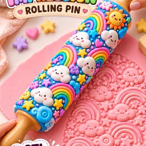 May include: A wooden rolling pin with a blue textured surface featuring raised colorful designs of smiling suns, rainbows, clouds, and stars. The text CLAY IMPRESSION ROLLING PIN and STL DIGITAL FILE NO PHYSICAL ITEM WILL BE DELIVERED are visible.