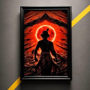 May include: A rectangular black frame containing a vertical art print. The artwork depicts a dark silhouette of a figure with a peacock feather in their hair, standing before a large, glowing red sun against a dark, abstract, fiery background.