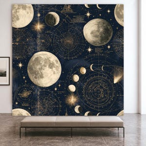 May include: A large wall tapestry featuring a dark navy blue background with a detailed celestial map. The design includes multiple phases of the moon, golden star illustrations, and intricate circular astronomical charts with fine lines and text.