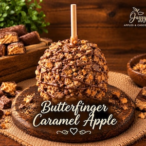 May include: A caramel apple coated in crushed Butterfinger candy pieces and drizzled with chocolate, featuring a wooden stick. The text reads Jazzy Apples & Chocolates and Butterfinger Caramel Apple with a heart icon.
