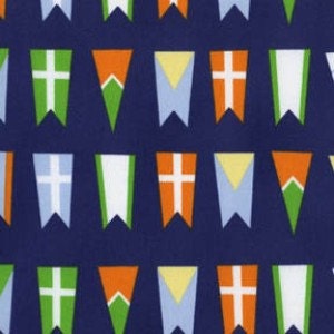 May include: A repeating pattern of colorful pennant flags against a dark blue background. The flags feature various designs, including crosses, triangles, and stripes in shades of green, orange, yellow, and white. The flags are evenly spaced and create a festive, decorative look.