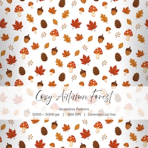 Puede incluir: Un patrón continuo con setas rojas y blancas, bellotas marrones, piñas y hojas de otoño naranjas sobre fondo blanco. El texto dice Cozy Autumn Forest, Seamless Pattern, 5000 x 5000 px, 300 DPI, Commercial Use.