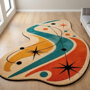 May include: An irregularly shaped area rug featuring a cream background with abstract, flowing waves in teal, mustard yellow, and burnt orange. The design includes black starburst motifs, thin black lines, and solid circles in teal and orange.