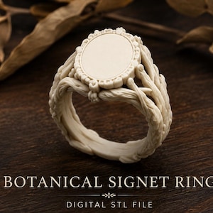 May include: A cream-coloured signet ring featuring a smooth oval face surrounded by a decorative beaded border, with a band intricately sculpted to resemble intertwined branches. The text BOTANICAL SIGNET RING DIGITAL STL FILE is visible.