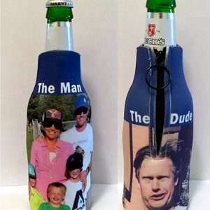 May include: Two blue neoprene bottle coolers with zipper closures. One cooler has the text "The Man" and a photo of a family. The other cooler has the text "The Dude" and a photo of a man.