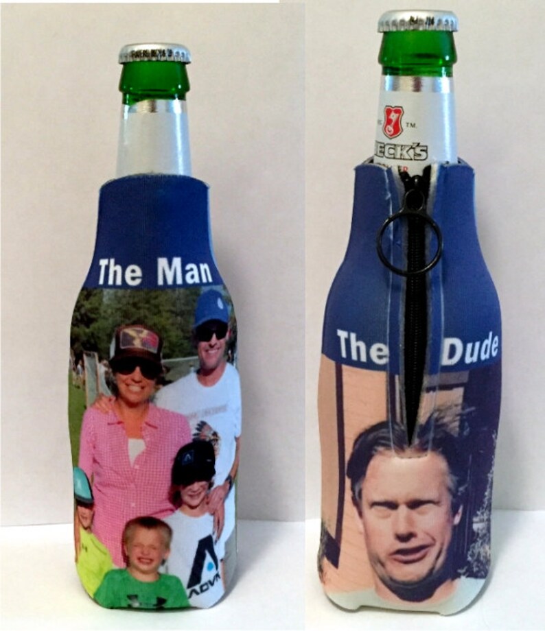 May include: Two blue neoprene bottle coolers with zipper closures. One cooler has the text "The Man" and a photo of a family. The other cooler has the text "The Dude" and a photo of a man.