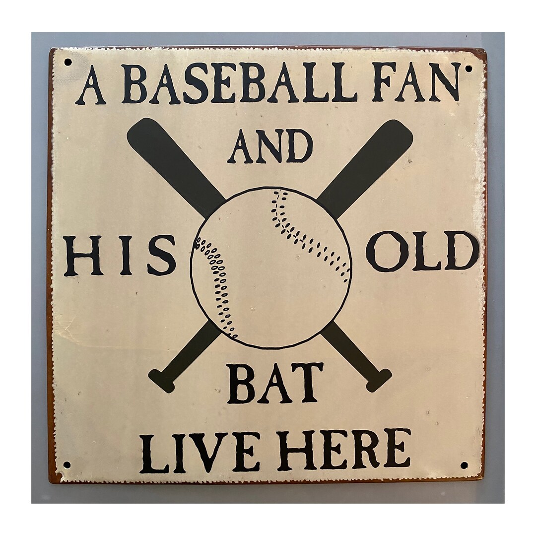 Fanático del béisbol y su viejo letrero de murciélago -  España