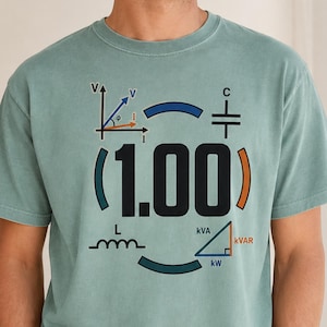 May include: A sage green short-sleeve t-shirt featuring a graphic print of electrical engineering symbols, including a phasor diagram, a capacitor, an inductor, a power triangle, and the bold black text 1.00 centered in the middle.