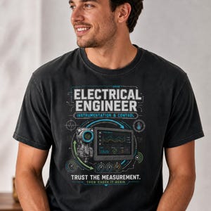 May include: A black short-sleeved t-shirt featuring a graphic print with the text ELECTRICAL ENGINEER INSTRUMENTATION & CONTROL and TRUST THE MEASUREMENT. THEN CHECK IT AGAIN. The design includes technical icons, a sensor, and a digital display.