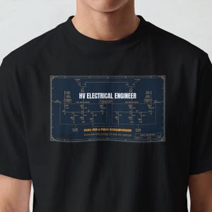 May include: A black t-shirt featuring a blue rectangular graphic of an electrical engineering schematic. The text reads HV ELECTRICAL ENGINEER, DUAL-FED & FULLY SYNCHRONISED, and because tripping is not an option, along with various technical labels.