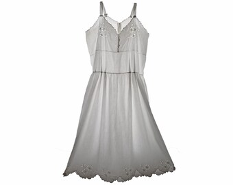 1900 Old lingerie, a sleeveless white linen and cotton dress, openwork embroidery