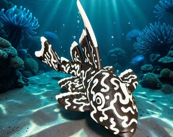 May include: A dark brown articulated fish figurine featuring a high-contrast white maze-like pattern across its body and fins. The fish has a prominent dorsal fin and segmented body sections, showcasing a detailed texture throughout its surface.