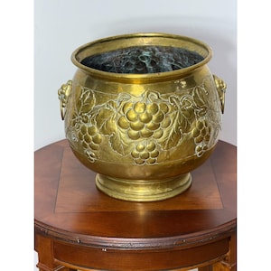 Victorian brass jardiniere cachepot repousse' grape motif lion head handles