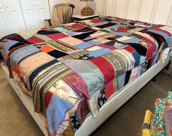 1920s crazy quilt with silks and velvets and embroidery Size 82" x 72"
