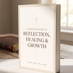 May include: A hardcover book with a cream-colored cover featuring a thin gold cross icon at the top. The text reads A CHRISTIAN GUIDE TO REFLECTION, HEALING & GROWTH, with the words REFLECT • PRAY • HEAL • GROW printed in smaller font at the bottom.