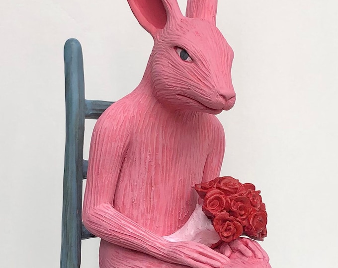 Pink rabbit with roses.