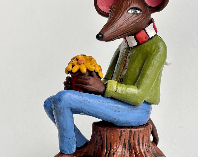 Mouse with yellow flowers.