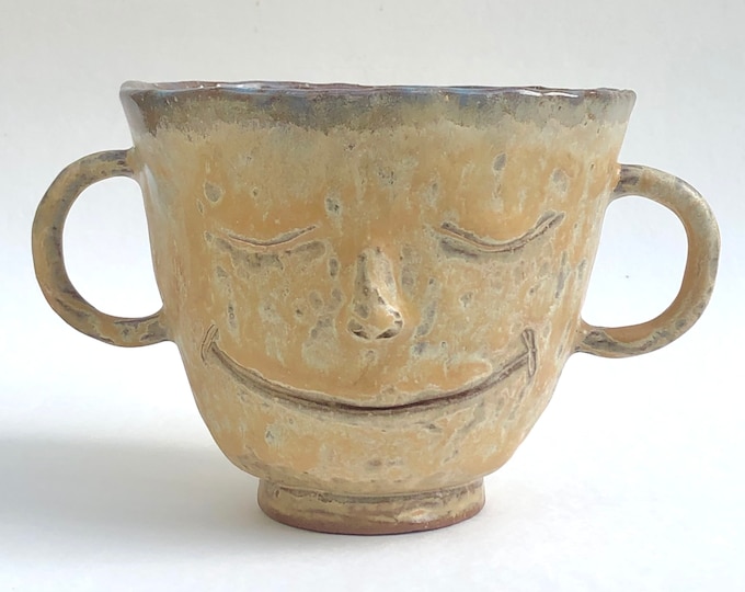 orange face pot, ceramic pottery