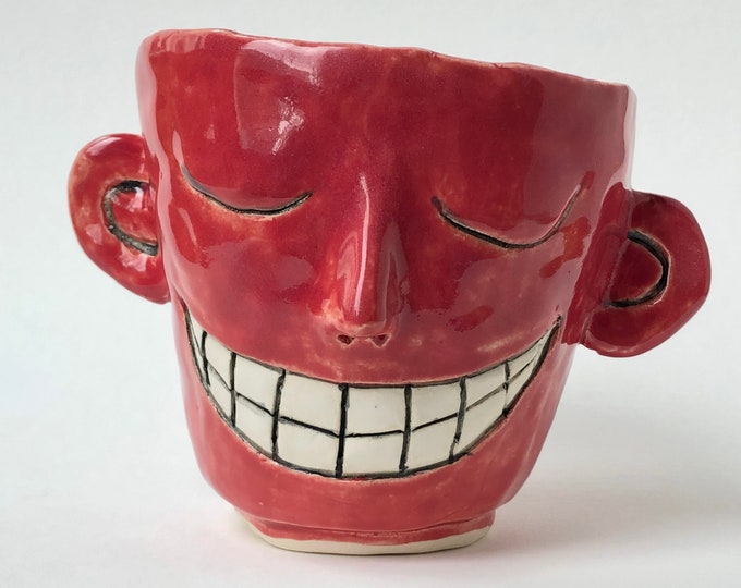 Red face pot.