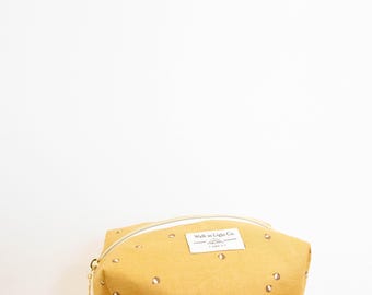 Kosmetiktasche mit Angelposen-Print
