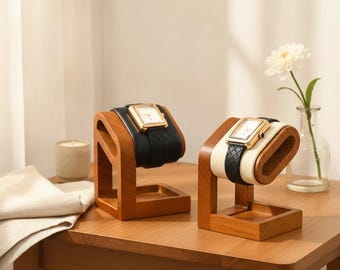 Espositore per orologi in legno dal design geometrico e moderno, ideale per la vendita al dettaglio o per collezioni personali.