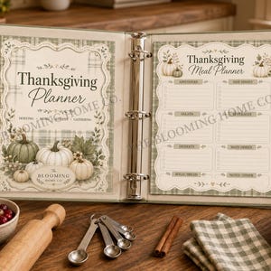 May include: A sage green three-ring binder open to display a Thanksgiving Planner and a Thanksgiving Meal Planner page. The pages feature illustrations of pumpkins, plaid patterns, and text including "Thanksgiving Planner" and "Thanksgiving Meal Planner".
