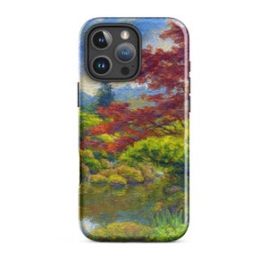 May include: A smartphone case featuring an impressionistic oil painting style design of a lush garden scene. The artwork displays vibrant red and orange autumn foliage, bright green bushes, mossy rocks, and a reflective pond under a blue sky.