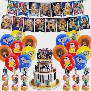 May include: A party decoration set featuring Sing movie characters, including a Happy Birthday banner, colorful balloons with character prints, and cupcake toppers. The central cake topper displays the movie cast above a Happy Birthday sign.